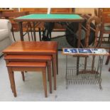 Four items of small furniture: to include a mid 20thC stained beech card table with folding legs