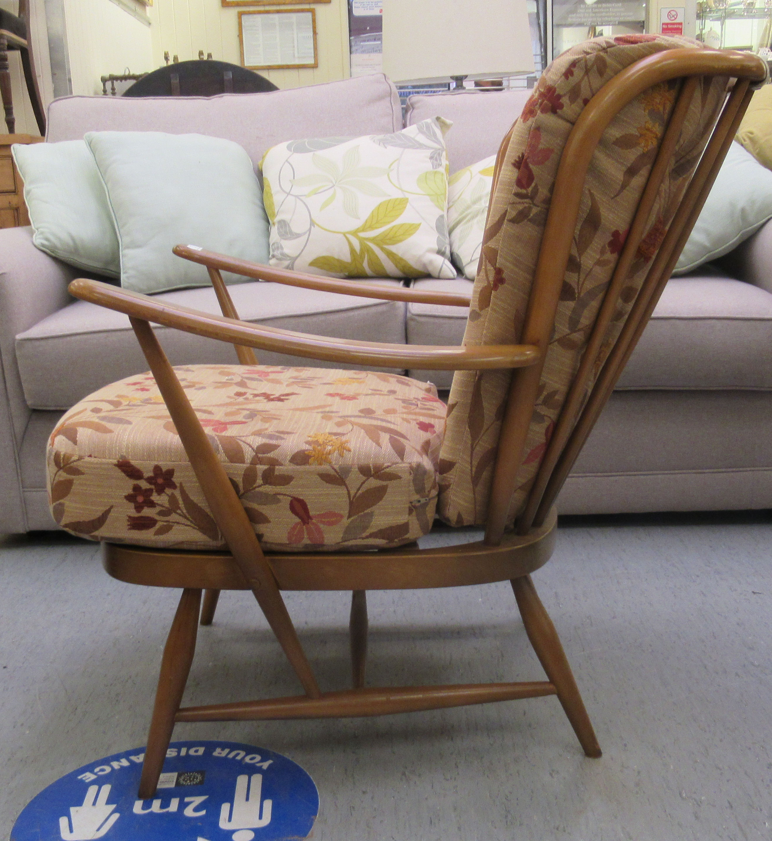 An Ercol Dawn beech and elm framed, low spindled back, - Image 2 of 4