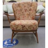 An Ercol Dawn beech and elm framed, low spindled back,