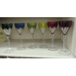 A set of six stemmed wines,