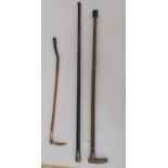 Two early 20thC walking sticks, each with a silver ferrule; and a riding crop with a horn handle