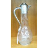 A late Victorian silver mounted wine jug with an S-shaped handle, collar, cap and base, engraved