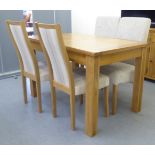 A modern light oak dining table, raised on block legs 30"h 51"h; and a matched set of four cream