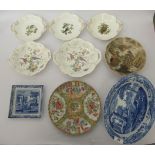 Decorative ceramics: to include a Japanese Satsuma dish, decorated with figures at the foot of a