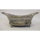 A Dutch silver coloured metal oval basket, the decoratively pierced, flared sides with cast cherubic
