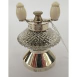 A late Victorian diamond cut glass and silver mounted salt grinder Birmingham 1893