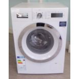 A Bosch Logixx9 washing machine 33"h 23.5"w