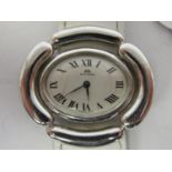 A lady's Bucherer silver coloured metal/stainless steel cased wristwatch, faced by an oval Roman