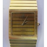 A Baume & Mercier 18ct gold designer bracelet wristwatch, the quartz movement faced by a square dial