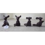 A set of four modern cast iron model mice  various poses  3"h