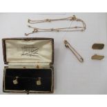 9ct gold items: to include a pair of shirt studs; and a pin brooch