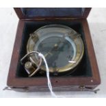 A reproduction of a circa 1906 brass cased and glazed compass  boxed