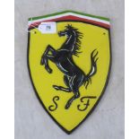 A modern painted cast metal shield shaped sign 'Ferrari'  11"h