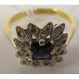 An 18ct gold sapphire and diamond set cluster ring