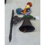 A painted cast iron novelty bracket door bell, surmounted by a cockerel  13"h