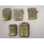 Five similar silver vesta cases with hinged caps and strike plates  mixed marks