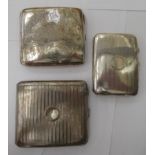 Three silver folding, cushion moulded cigarette cases with engine turned and scroll engraved