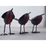 A set of three painted tinplate models, Robins  5"h