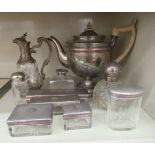 Silver and silver plated items: to include a set of four cut glass dressing table boxes with