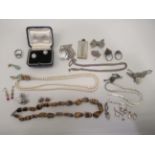 Silver, pearls and other items of personal ornament: to include an ingot; and a pair of paste set