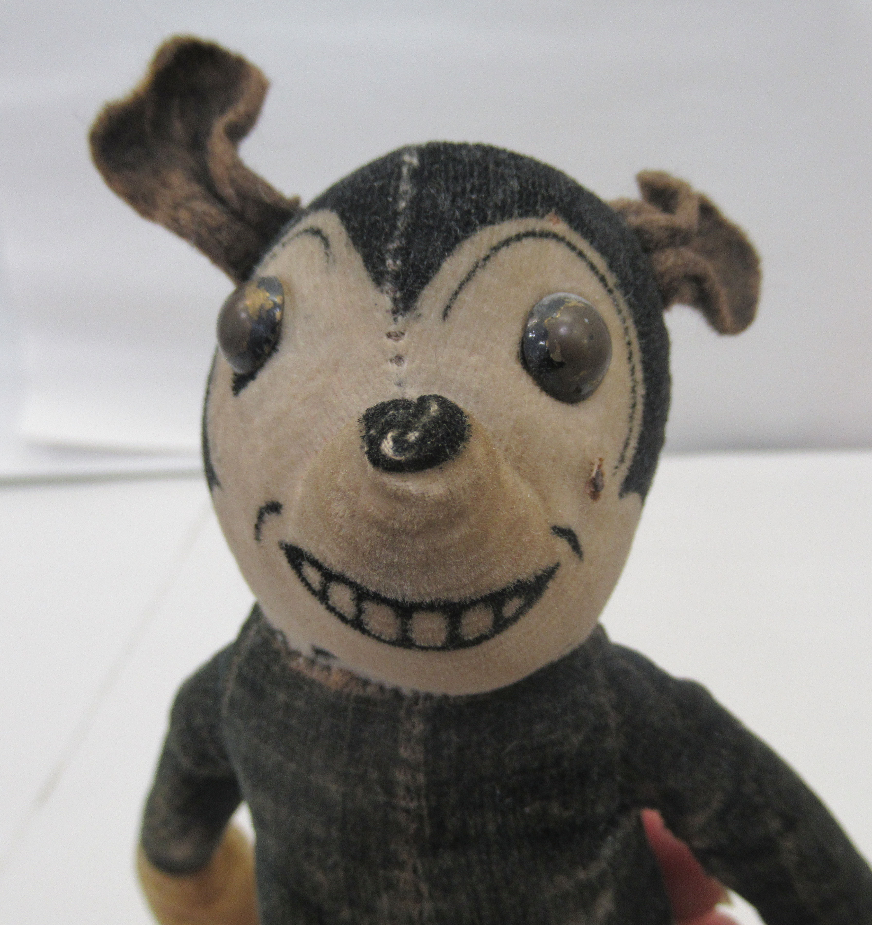 A circa 1930s stuffed, stitched, fabric toy 'Mickey Mouse' with mobile limbs  bears a label Deans - Image 3 of 4