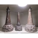 Three similar 19thC Cornish rough-cut and turned granite 'lighthouse' ornaments  8.5" & 11"h