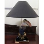 A modern china and gilt metal table lamp, fashioned as a Toucan, on a perch  18"h