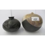 Two studio pottery spherical vases, one black with incised ornament  4"dia, the other, part