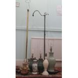 Interior lighting: to include a pair of Oriental antique effect, cast metal table lamps  13"h
