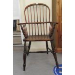 A 19thC and later elm and mahogany framed high hoop and spindle back open armchair, the solid seat