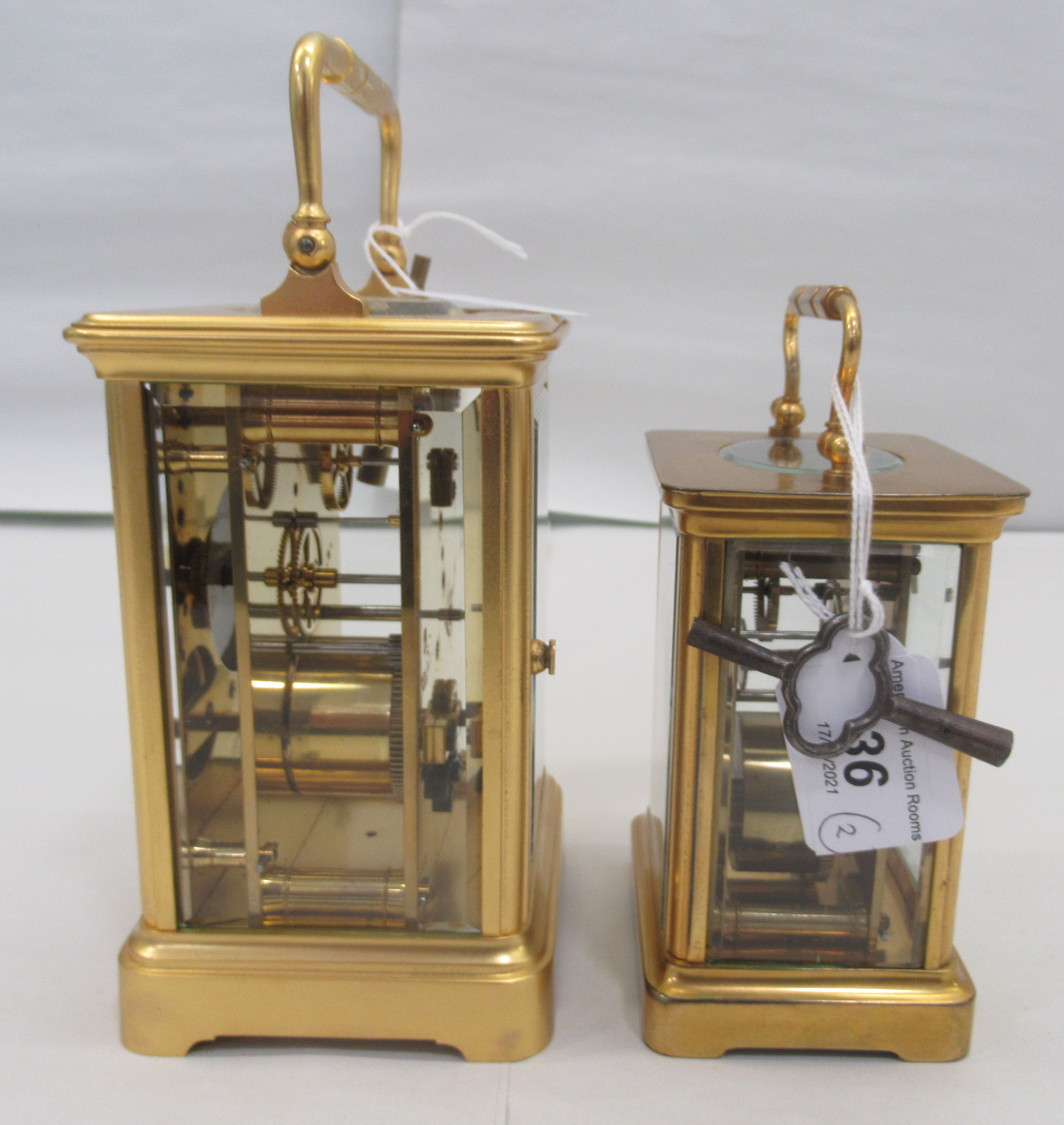 Two similar 20thC brass cased carriage timepieces with bevelled glass panels and folding top - Image 4 of 6