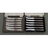 A cased set of six stainless steel tea knives, on silver handles  mixed marks