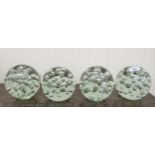A set of four clear coloured glass door stops with interior bubbled ornament  6"h