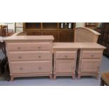 A Silentnight limed beech finished bed with a wasted round topped head and footboard, connected by