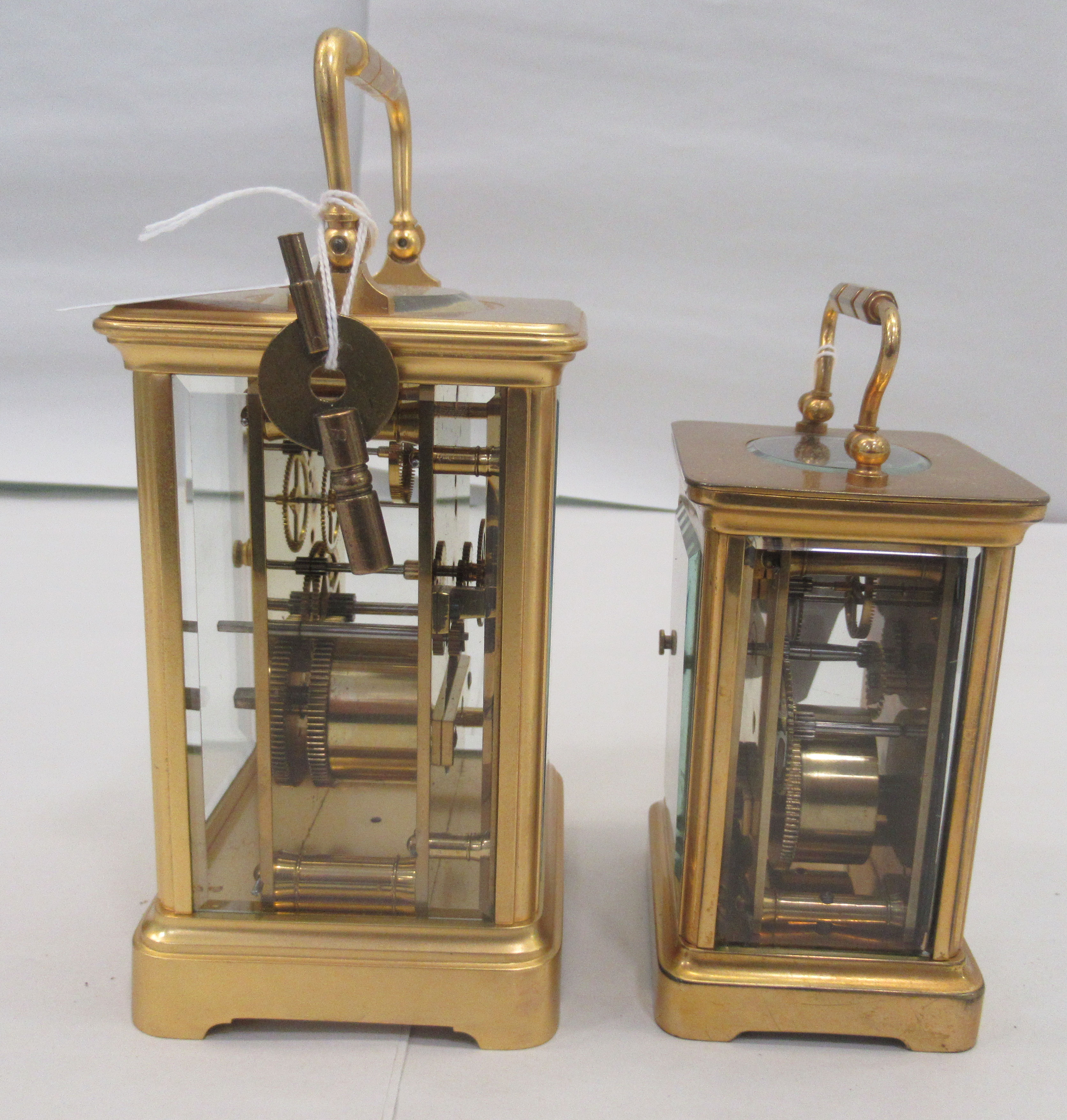 Two similar 20thC brass cased carriage timepieces with bevelled glass panels and folding top - Image 2 of 6