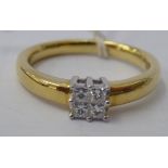 An 18ct gold ring, square set with four diamonds