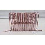 A 1970s red painted wire, forty division record stand, on splayed feet  6"h  14"L