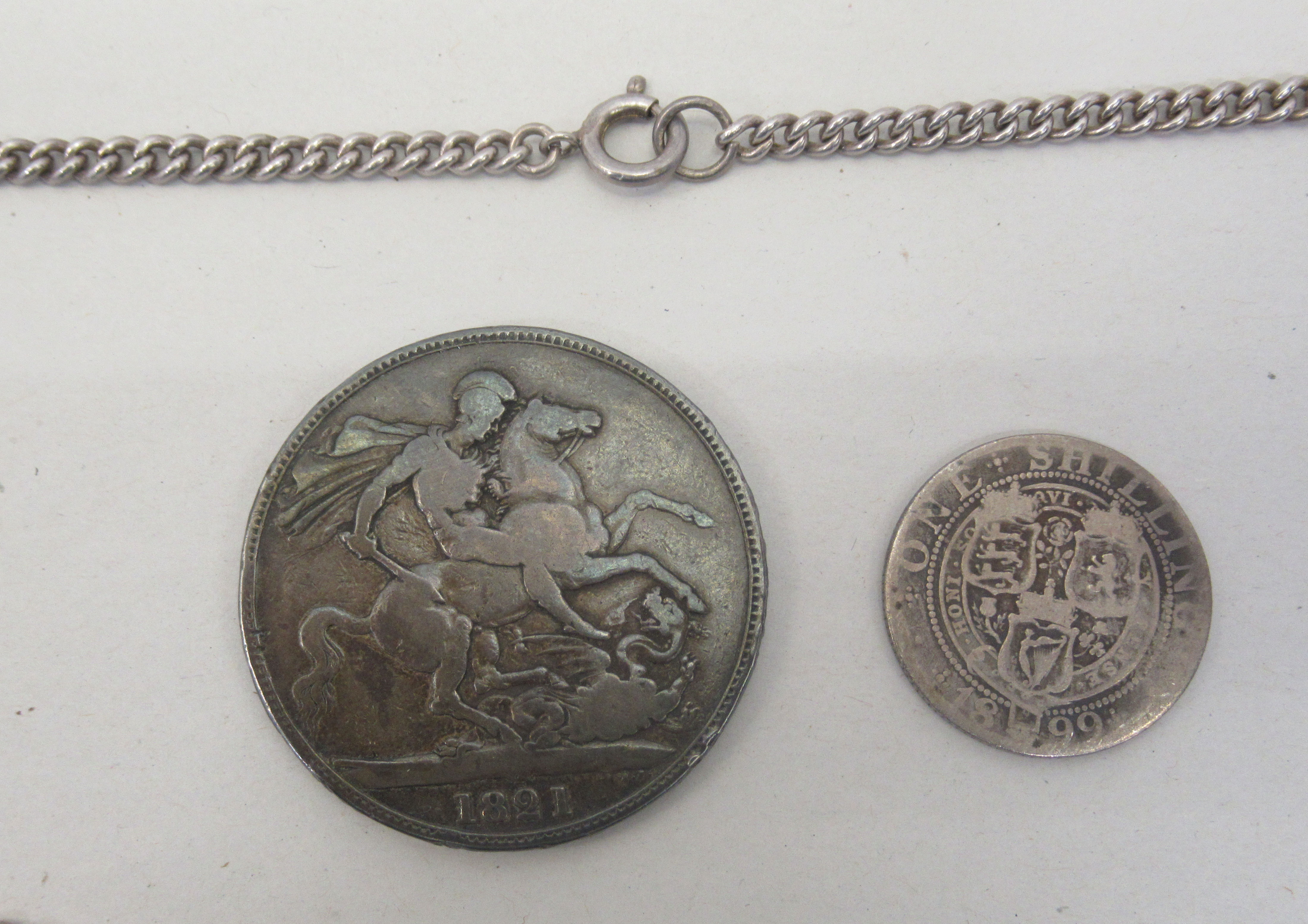 A George IV crown  1821; a Victorian crown  1891, in a silver mount, on a fine neckchain; and a - Image 2 of 5