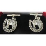 A pair of silver horseshoe cufflinks, set with marcasite  stamped 925