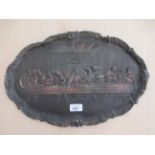 A 20thC bronze effect, cast metal oval plaque 'The Last Supper'  11" x 17"