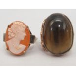 A 9ct gold cameo ring; and another 9ct gold ring, set with (possibly) tigers eye stone