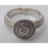 A 9ct white gold, claw set single stone diamond ring