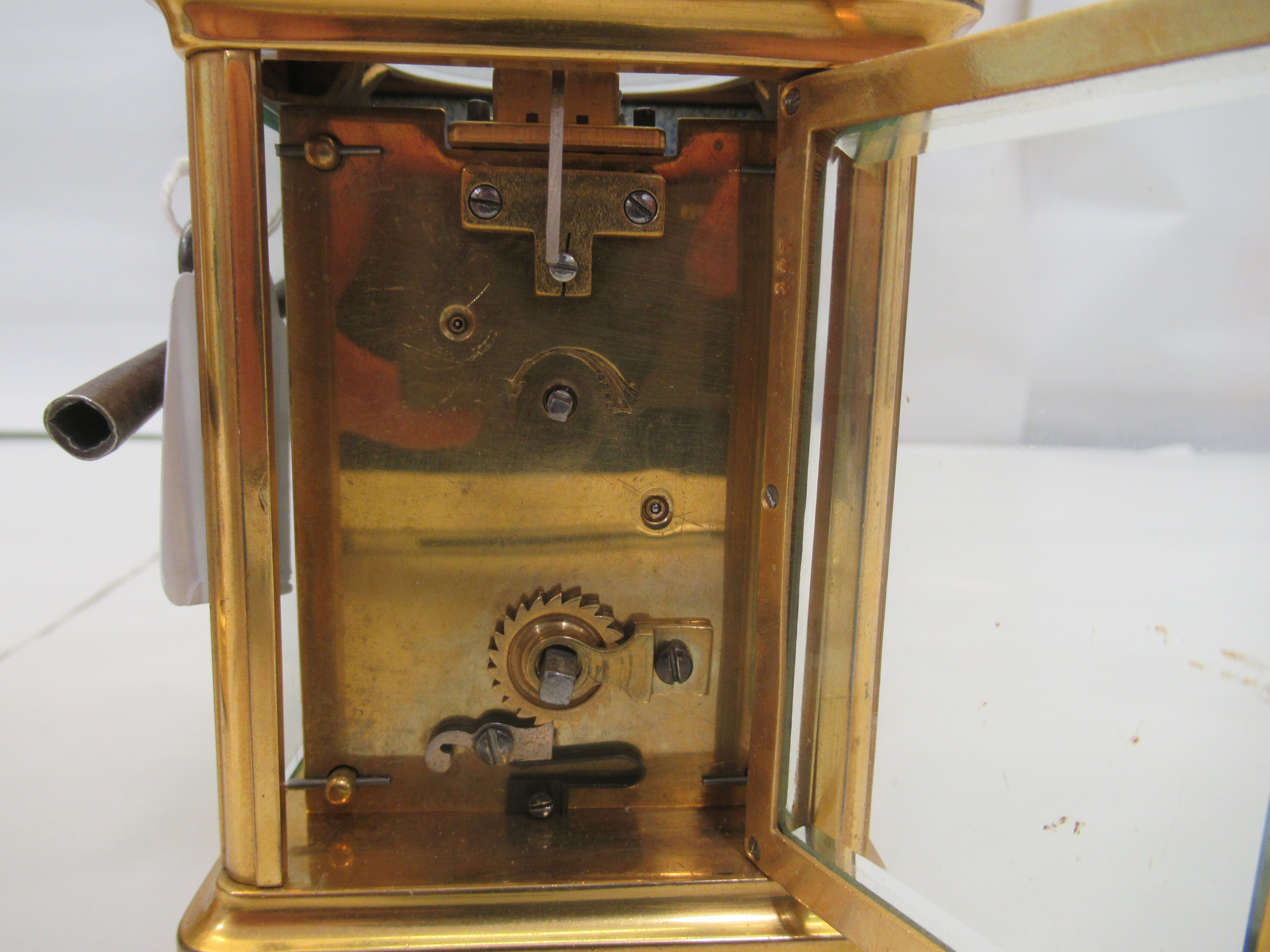 Two similar 20thC brass cased carriage timepieces with bevelled glass panels and folding top - Image 5 of 6