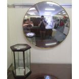 A modern convex mirror, in a composition gilt frame  24"dia; and a modern mahogany finished three