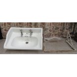 An early 20thC 'Castle Baynard' porcelain sink, on a contemporary cast iron wall bracket