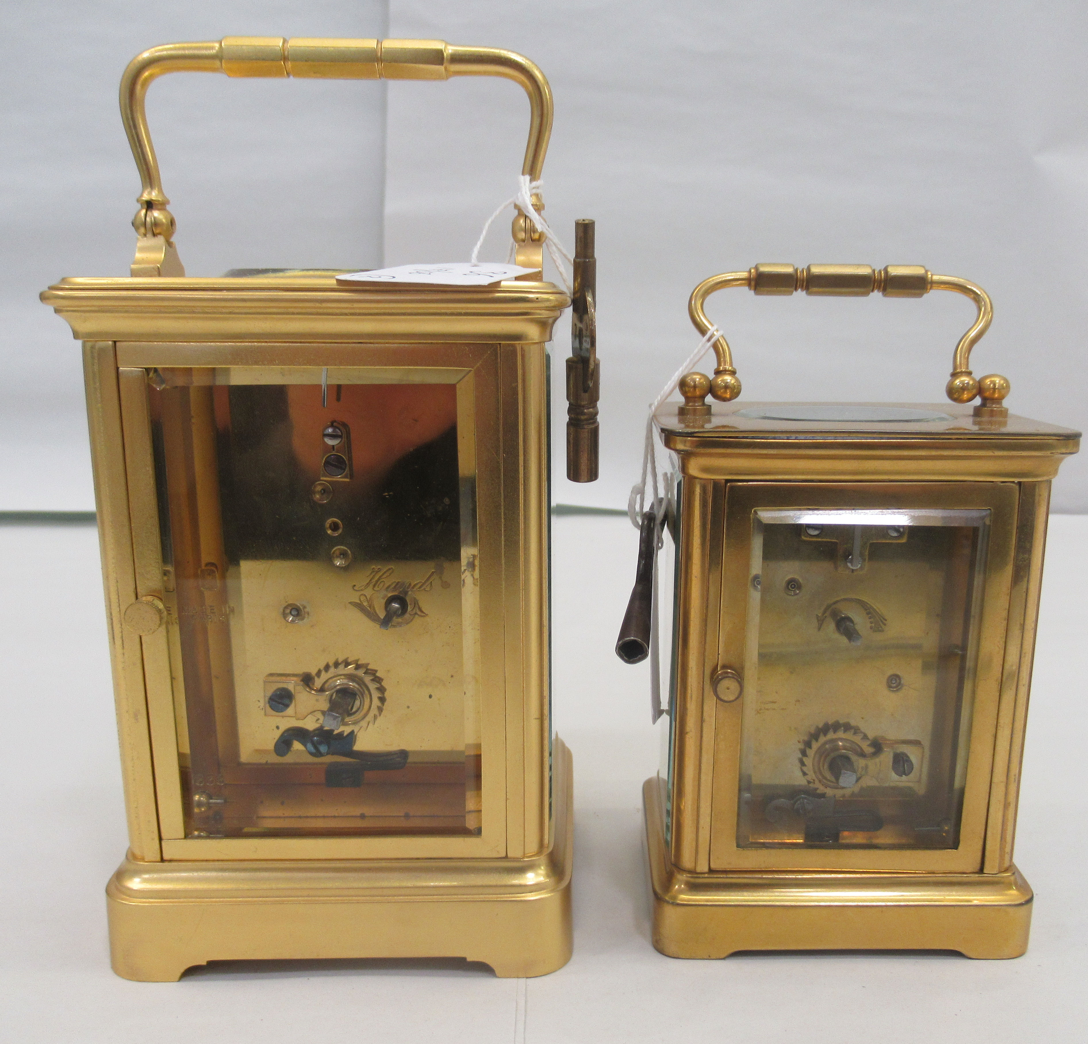 Two similar 20thC brass cased carriage timepieces with bevelled glass panels and folding top - Image 3 of 6
