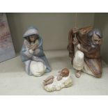 Lladro porcelain nativity figures, viz. Mary  8"h; Joseph  9.5"h; and the Baby Jesus  boxed
