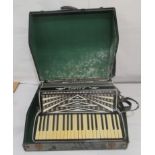 A Soprani of Italy piano accordion  cased