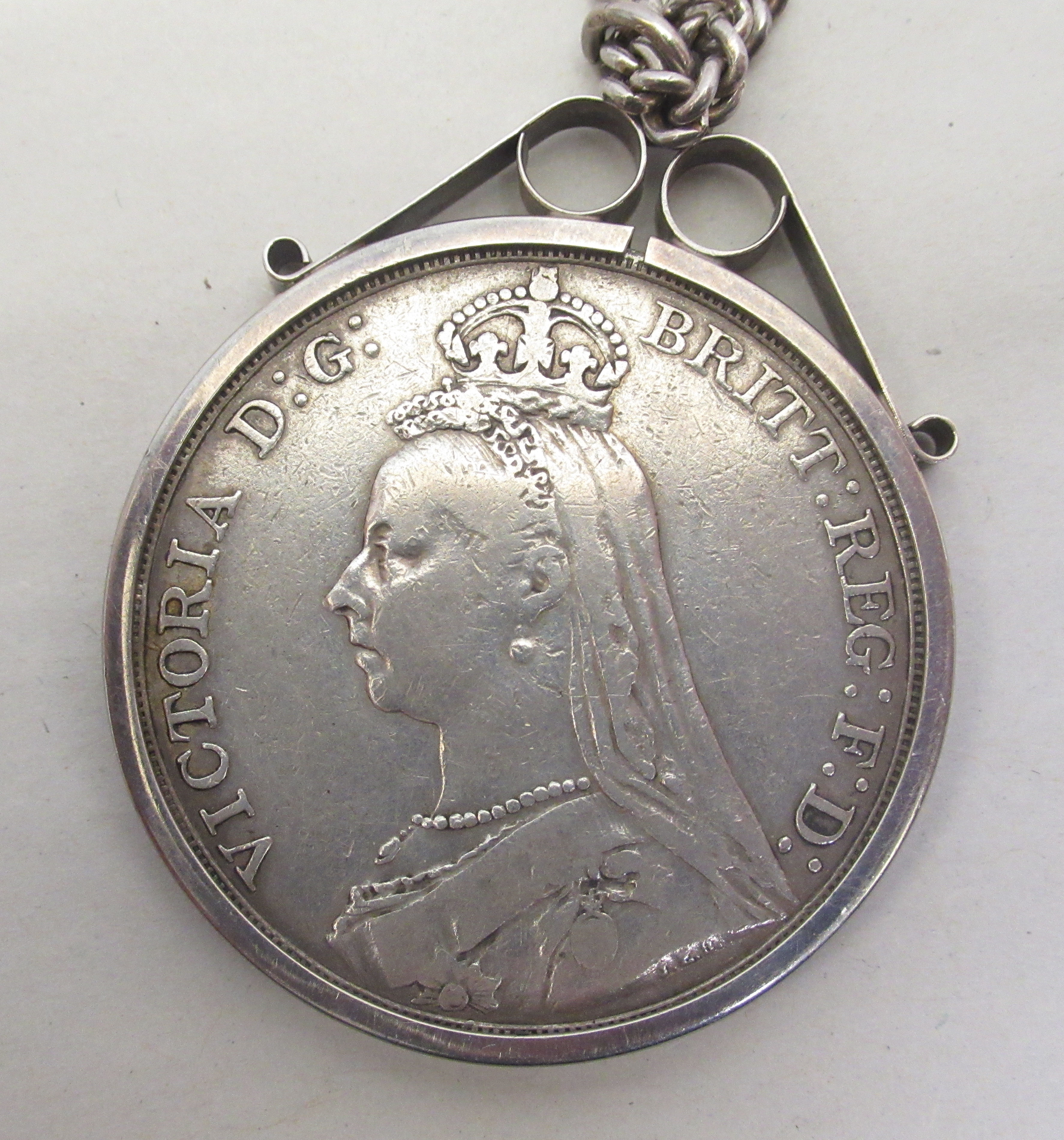 A George IV crown  1821; a Victorian crown  1891, in a silver mount, on a fine neckchain; and a - Image 5 of 5