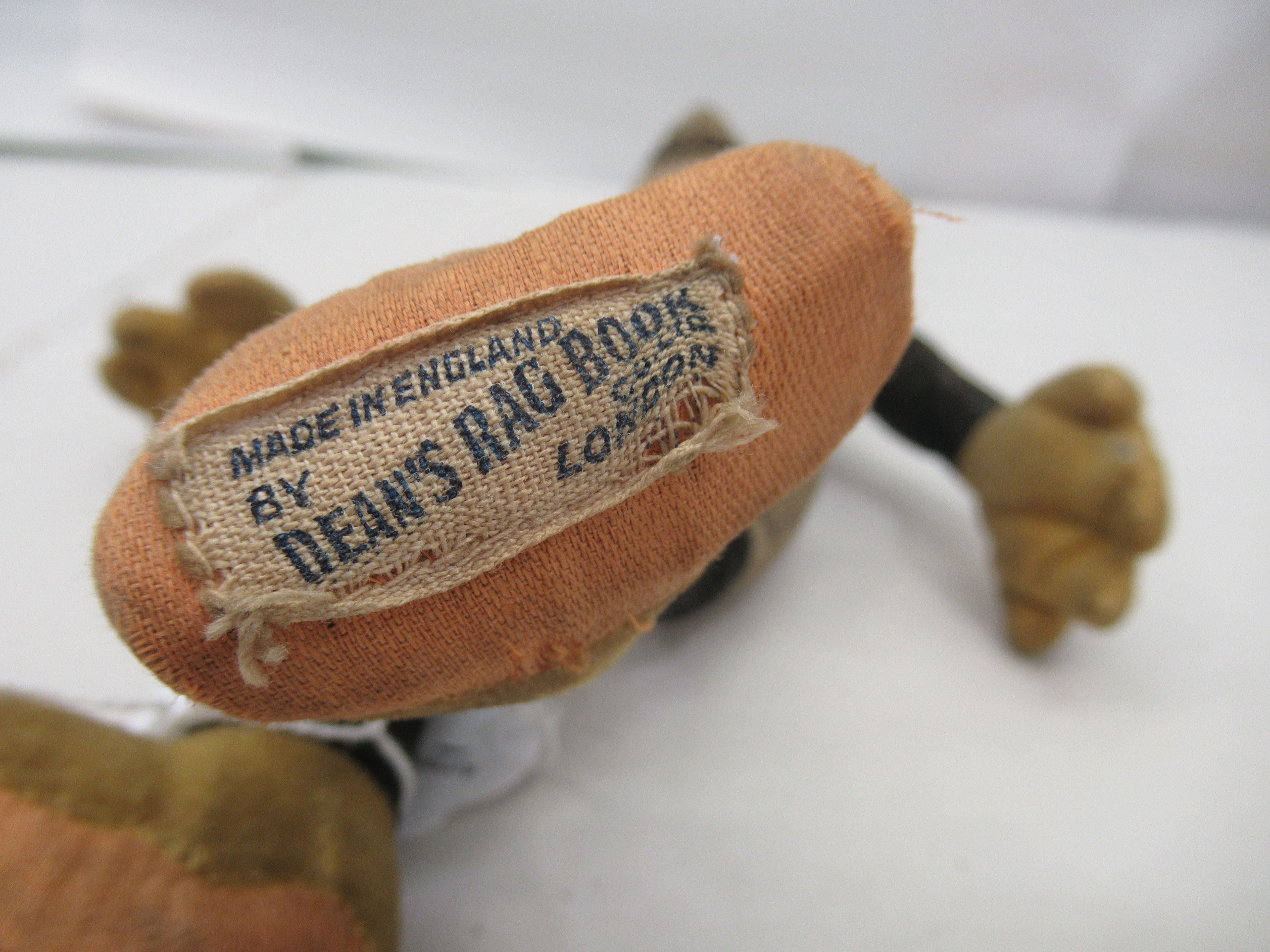 A circa 1930s stuffed, stitched, fabric toy 'Mickey Mouse' with mobile limbs  bears a label Deans - Image 4 of 4